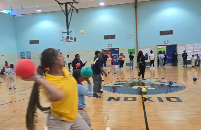  Students and staff playing dodgeball